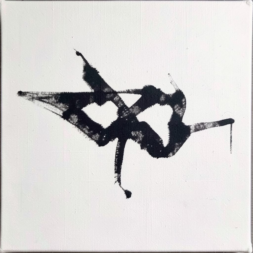Dark ink-like abstract mark on raw canvas